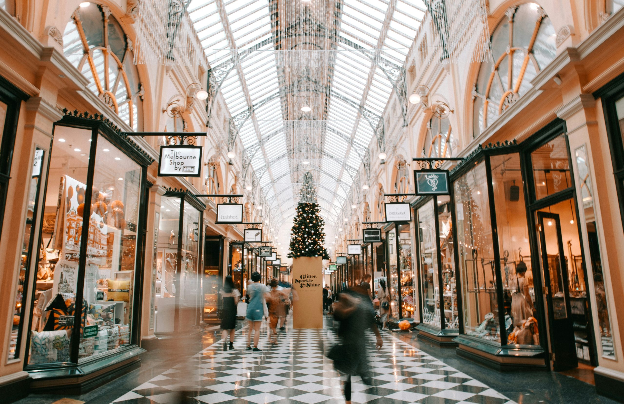 holiday shopping, mall decorated for the holidays, people doing their holiday shopping